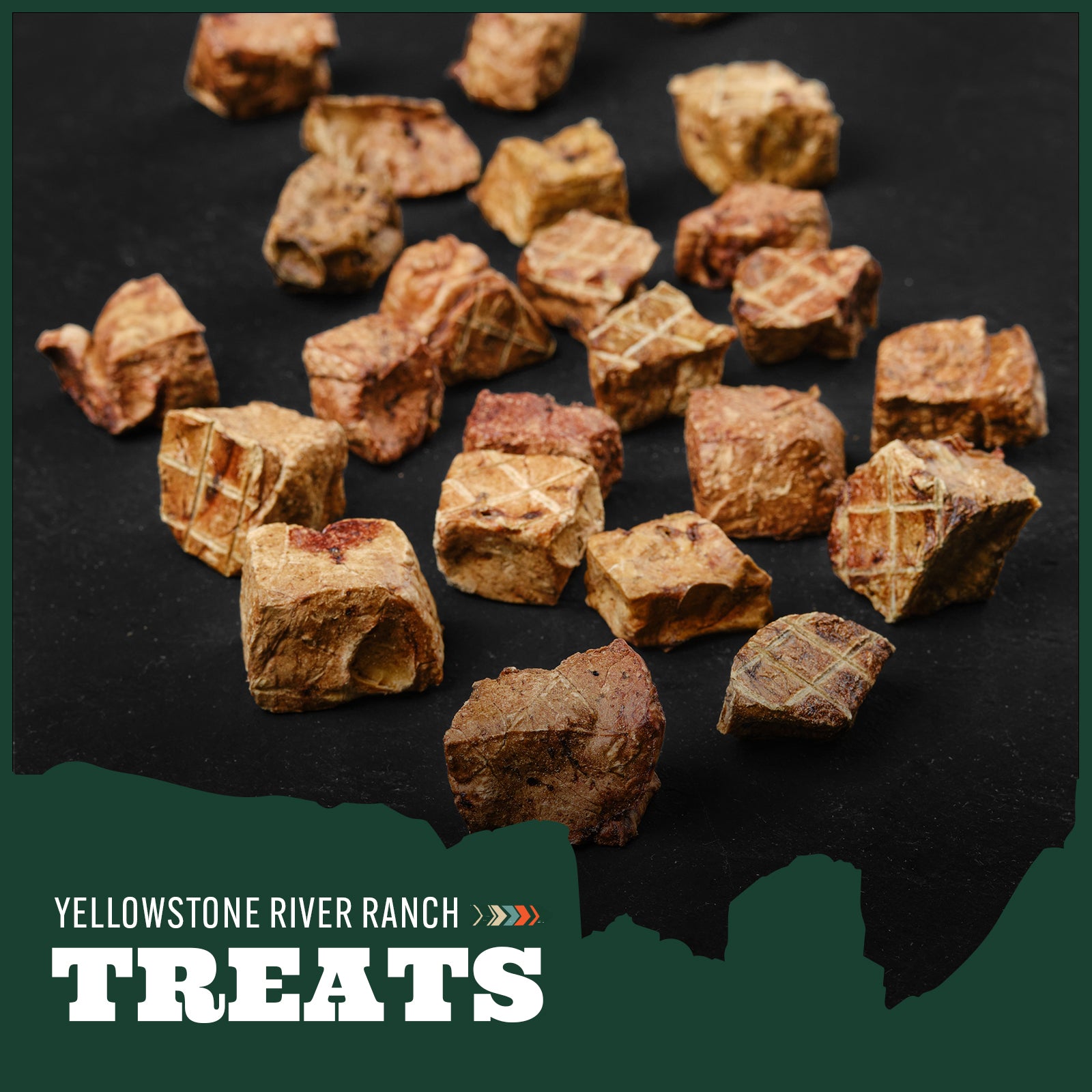 Dog treats with a textured surface on a dark background.
