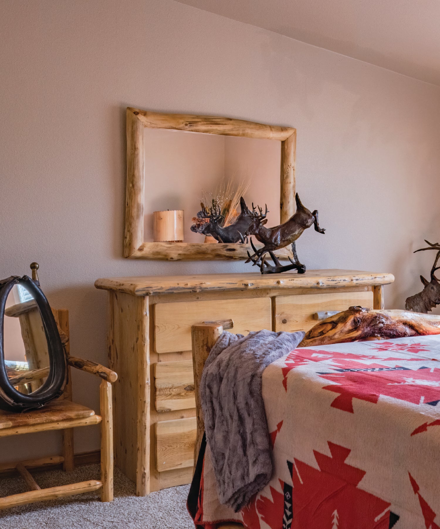 Wooden dresser with decorative items in a bedroom 