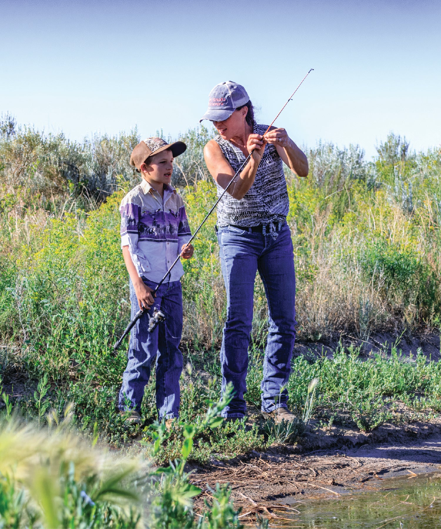 Mother and son fishing in the Yellowstone River