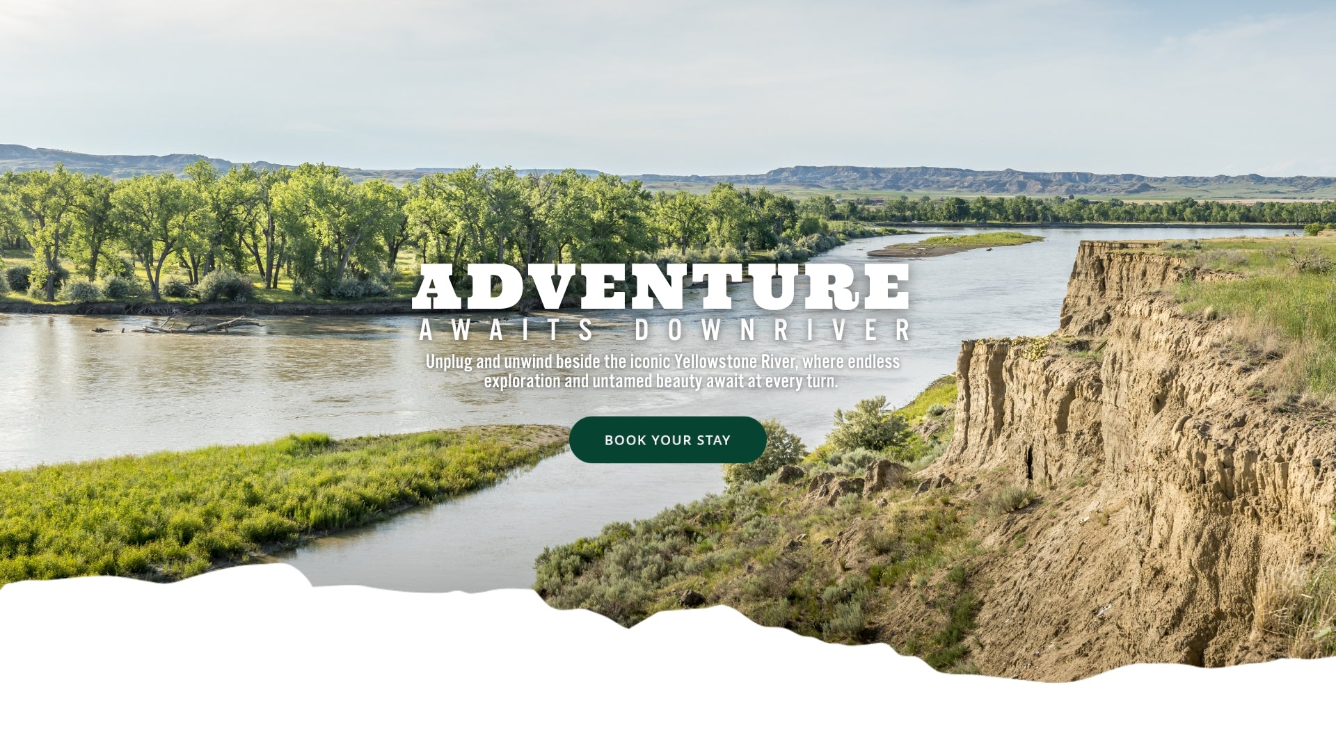 Scenic view of Montana's Yellowstone River with cliffs and trees, featuring text 'Adventure Awaits Downriver'.