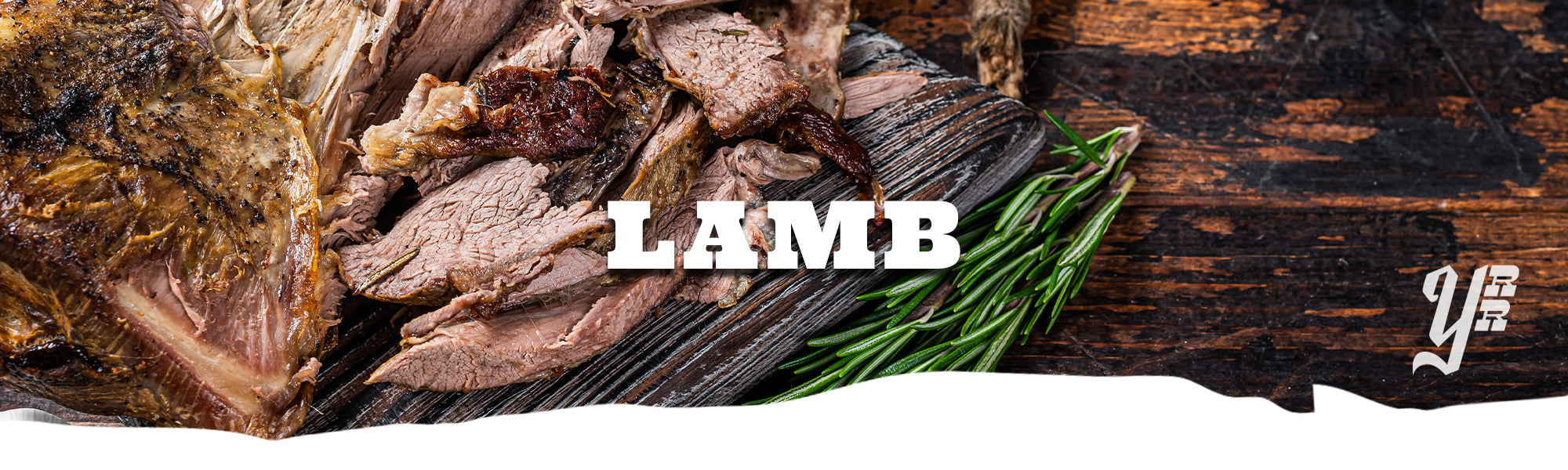 Sliced cooked lamb with rosemary on a wooden board, labeled 'LAMB' with a brand logo.
